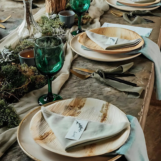 A table setting with disposable plates and cutlery, highlighting zero waste dining options
